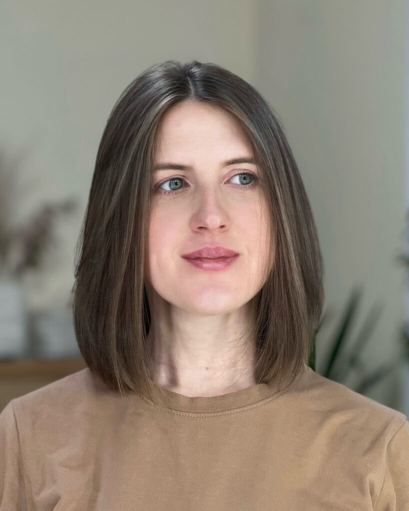 Simple center-parted long bob at shoulder length