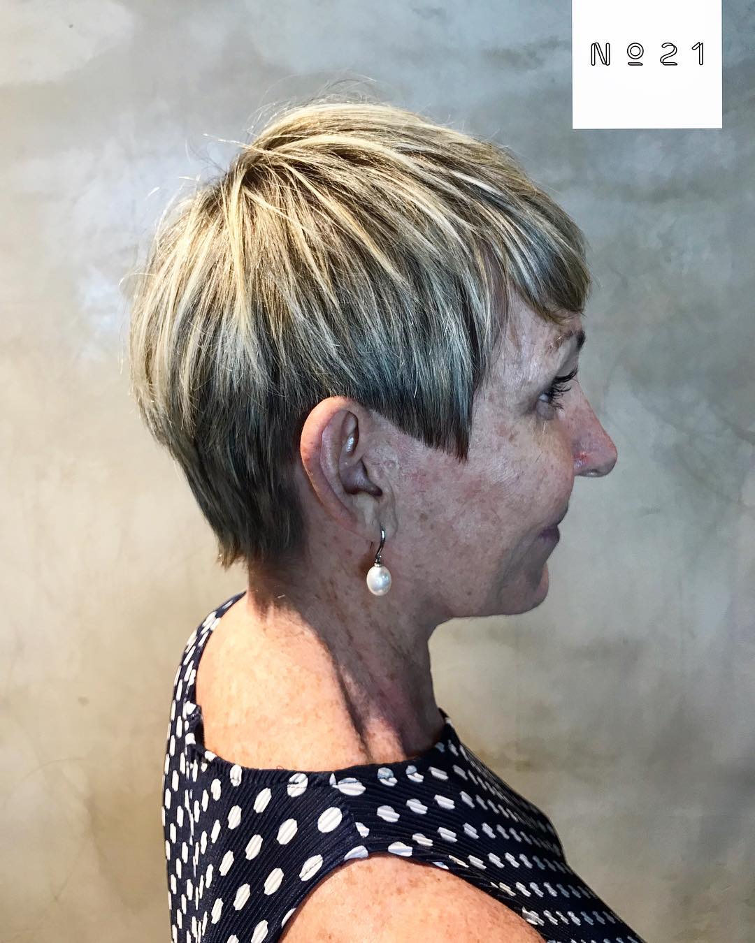 Soft layered pixie with side swept fringe and crown volume
