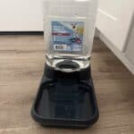 a plastic gravity bowl on floor