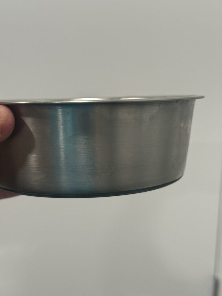 a dog bowl for cleaning