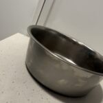 a dog bowl for food on countertop