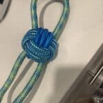 a rope toy for tug of war on kitchen counter