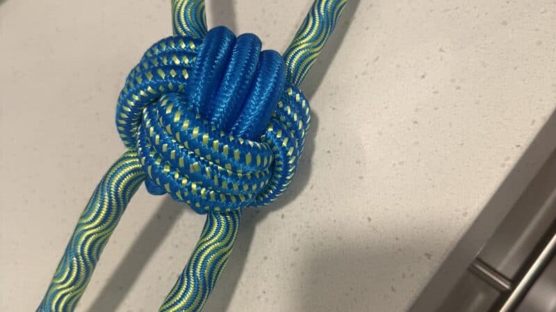 a rope toy for tug of war on kitchen counter