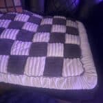 a couch cover on couch covering up