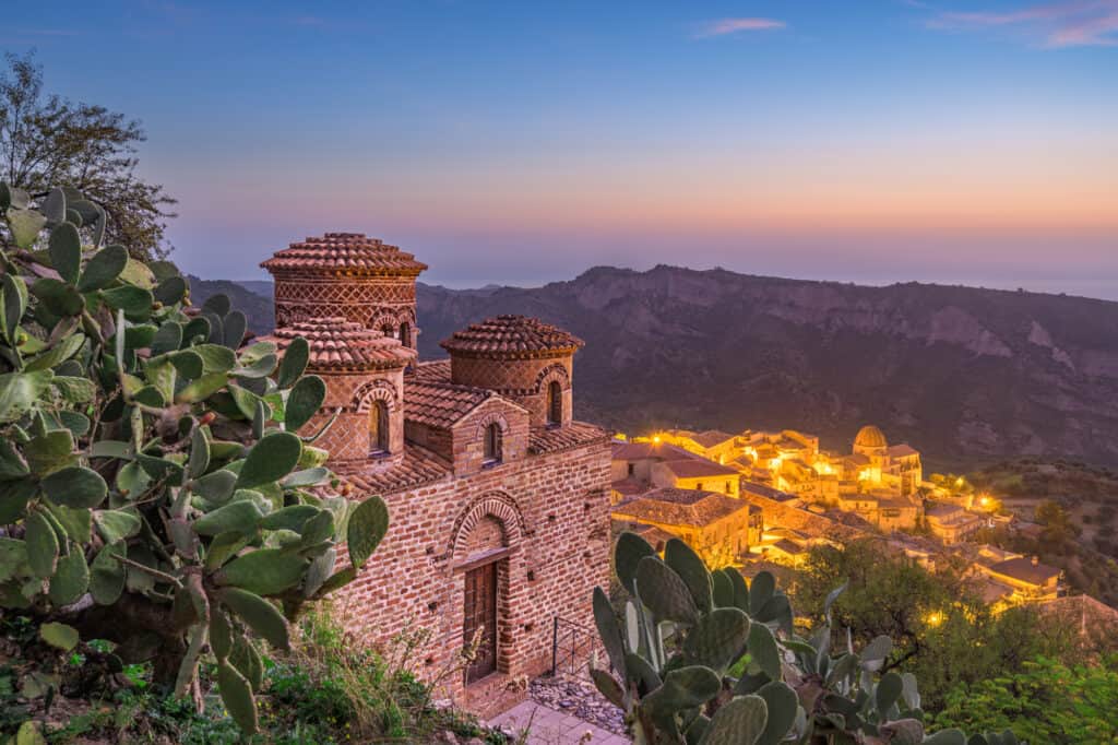 View at dusk of Byzantine Church and village of Stilo in Calabria, Southern Italy