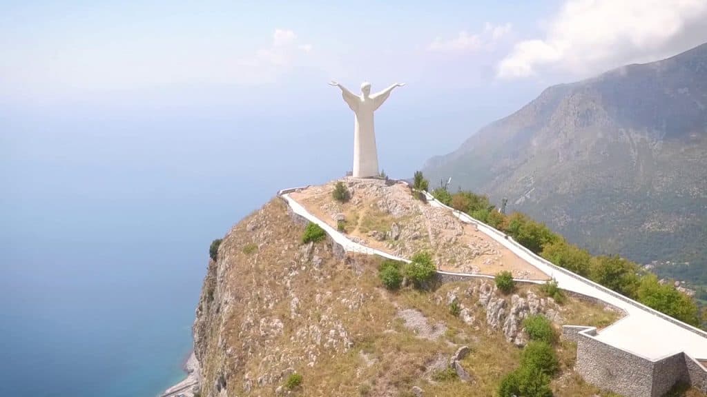 Iconic Christ the Redeemer statue overlooking Maratea, Italys landscape and coastline.