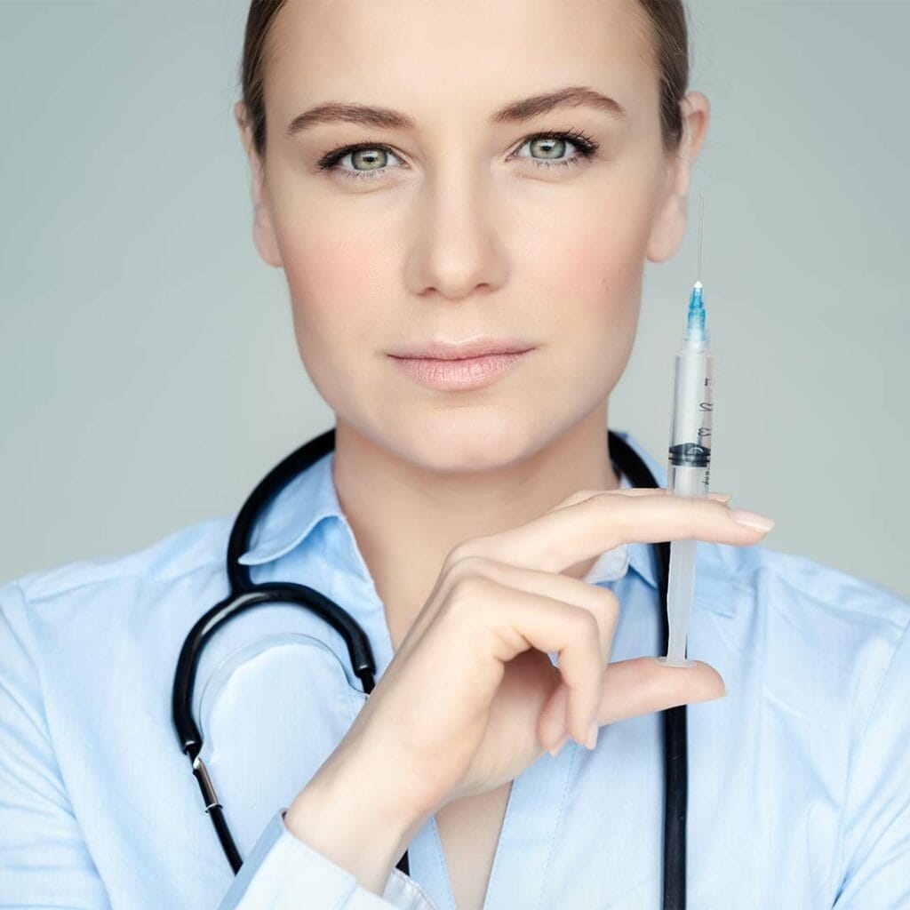 Syringe with dental anesthetic for pain-free dental treatments at Heritage Dental Centre.