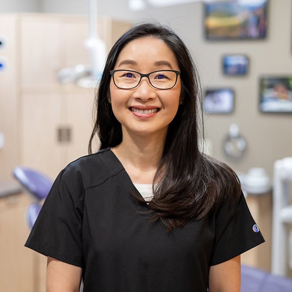 Friendly female dental professional at Heritage Dental Centre, providing expert dental care in Edmonton.