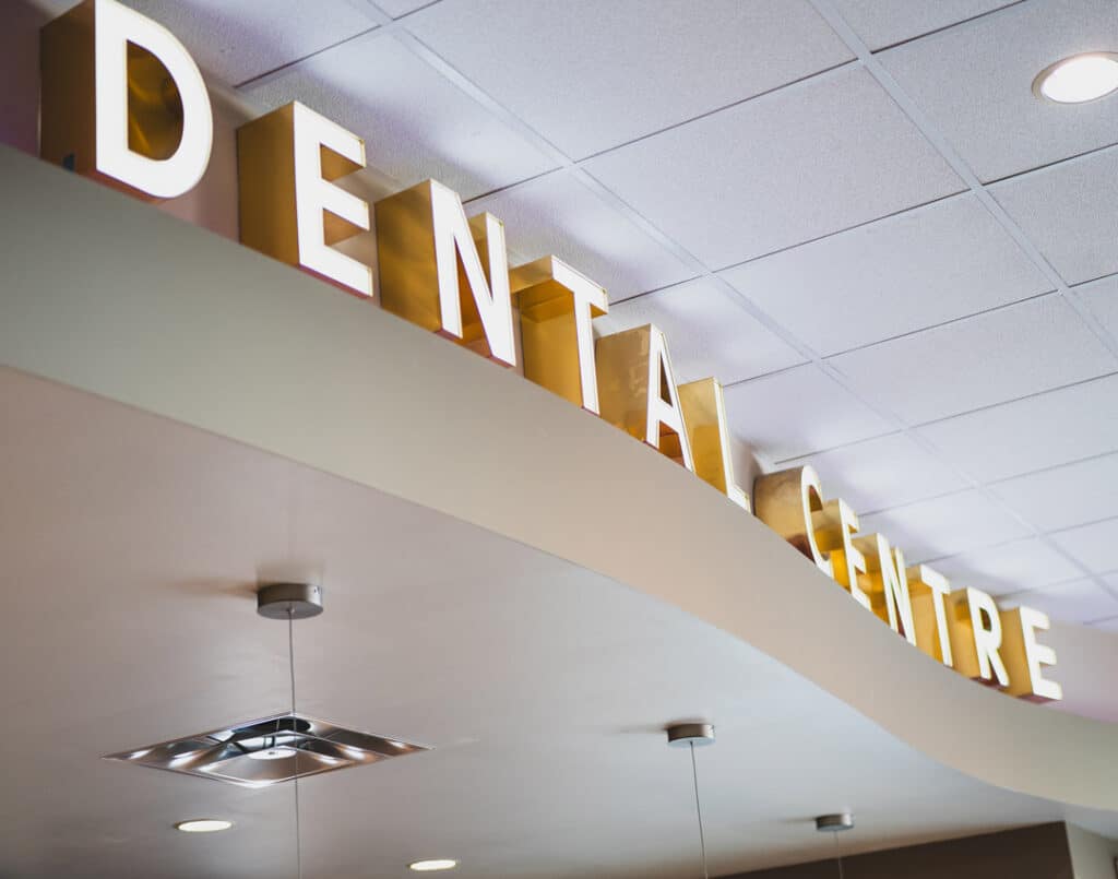 Dental office interior sign at Heritage Dental Centre in Edmonton.