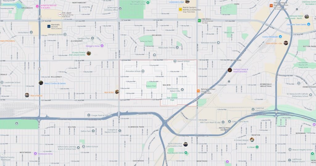 Map of city streets and landmarks with a sunset sky background, highlighting key locations and transportation routes.