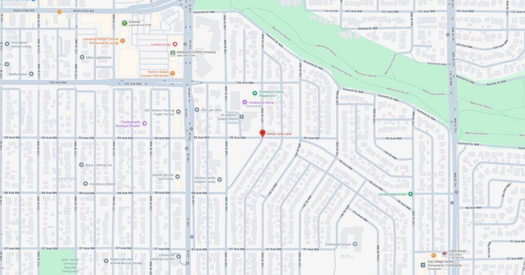 Map showing a suburban neighborhood with streets, houses, and a nearby green park area, highlighting local streets and community layout.