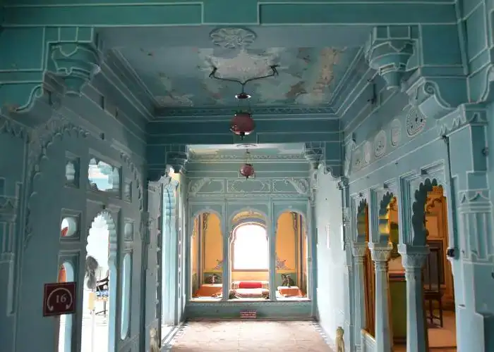 Elegant heritage palace interior in Rajasthan with intricate architecture and traditional design.
