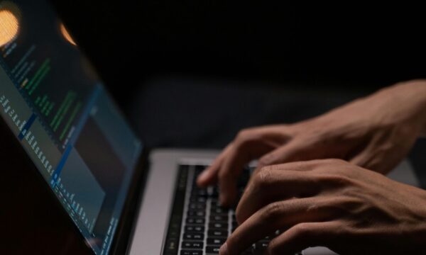 person-using-silver-and-black-laptop-computer