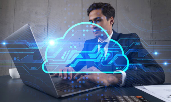 Businessman in office working with laptop technology storage cloud typing computer assemble data drawing concept.