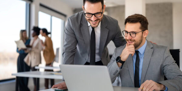 Bankers in a finance office manages portfolios, credit and risk, delivering wealth management, compliance, and professional financial strategy with expertise