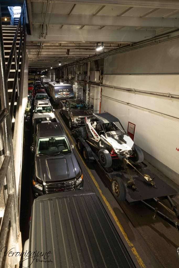 Cars loaded in a long line inside the Badger