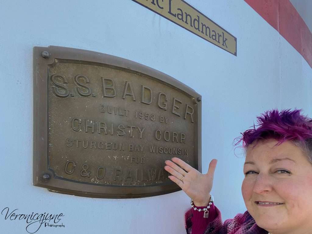 The author points at the National HIstoric landmark plaque