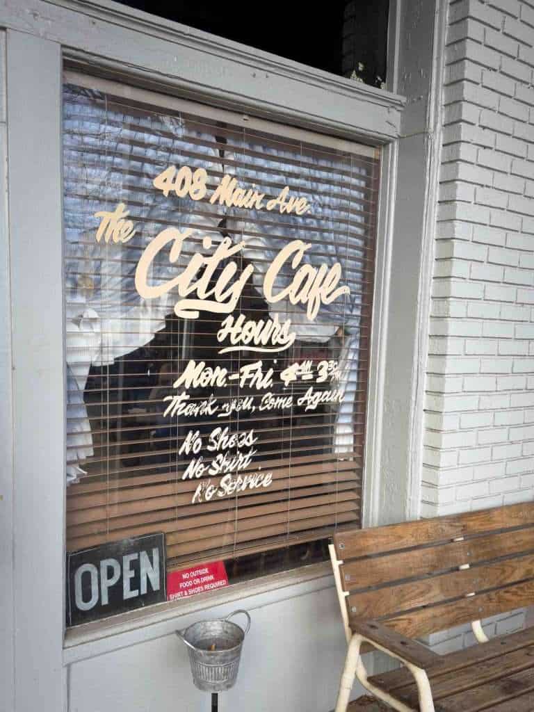 The sign on the door of City Cafe