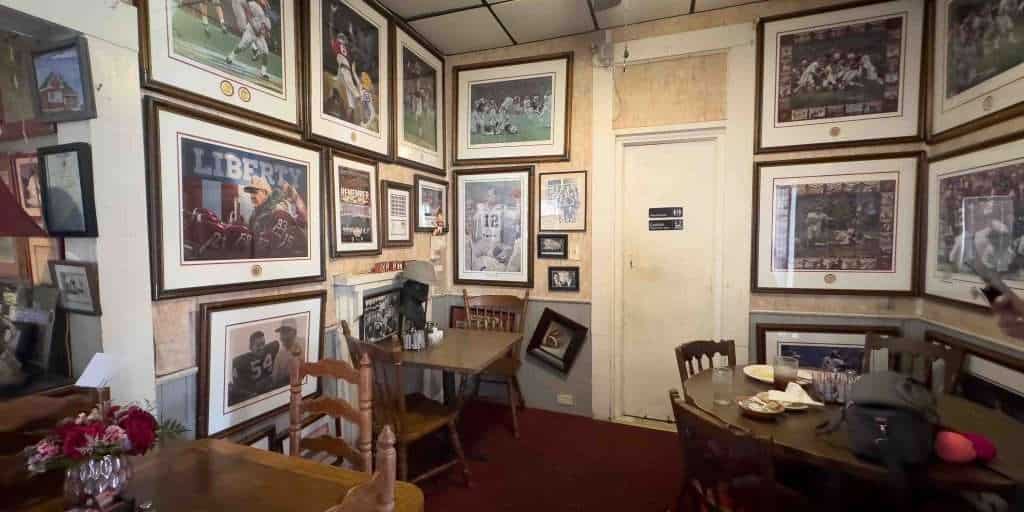 The table at Waysider with Bear Bryant's hat on display
