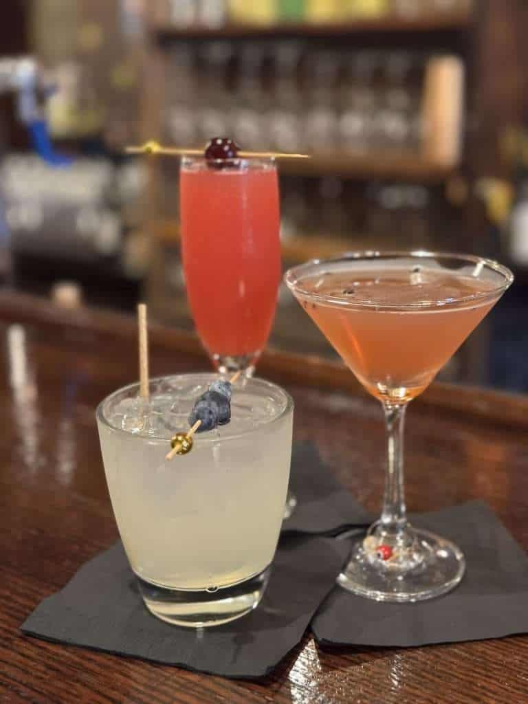 Colorful craft cocktails served at Alchemie, a popular bar in Johnstown PA.