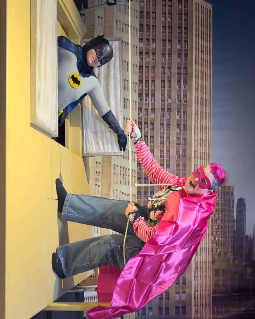Visitor posing with Batman at Fiberglass Freaks Batman Museum in Logansport, Indiana