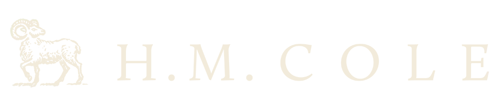 H.M. Cole logo displayed on website header for branding and recognition.