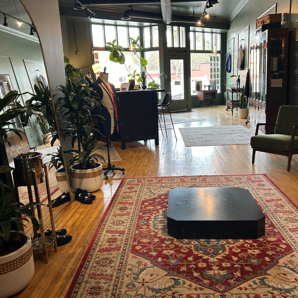 Cozy boutique shop interior with plants and seating in Spokane, WA.