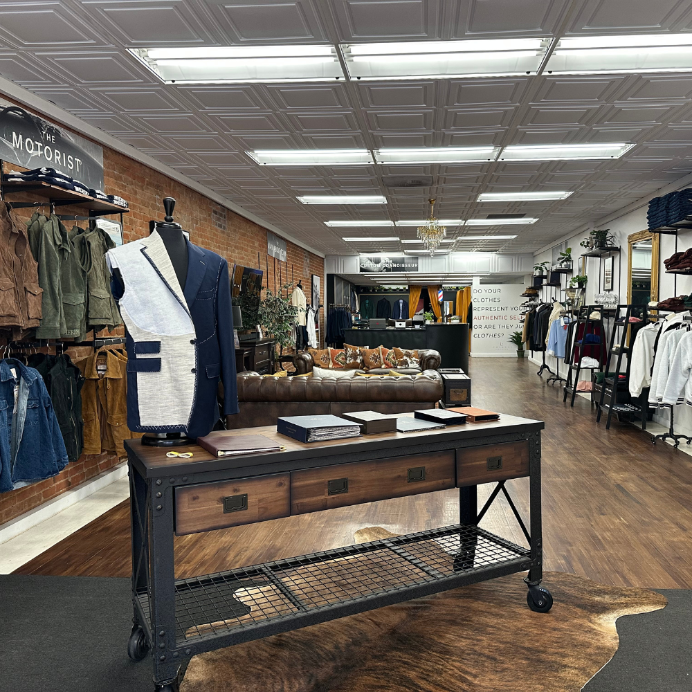 Interior view of H.M. Cole clothing boutique in Colorado Springs, showcasing stylish apparel and acc.