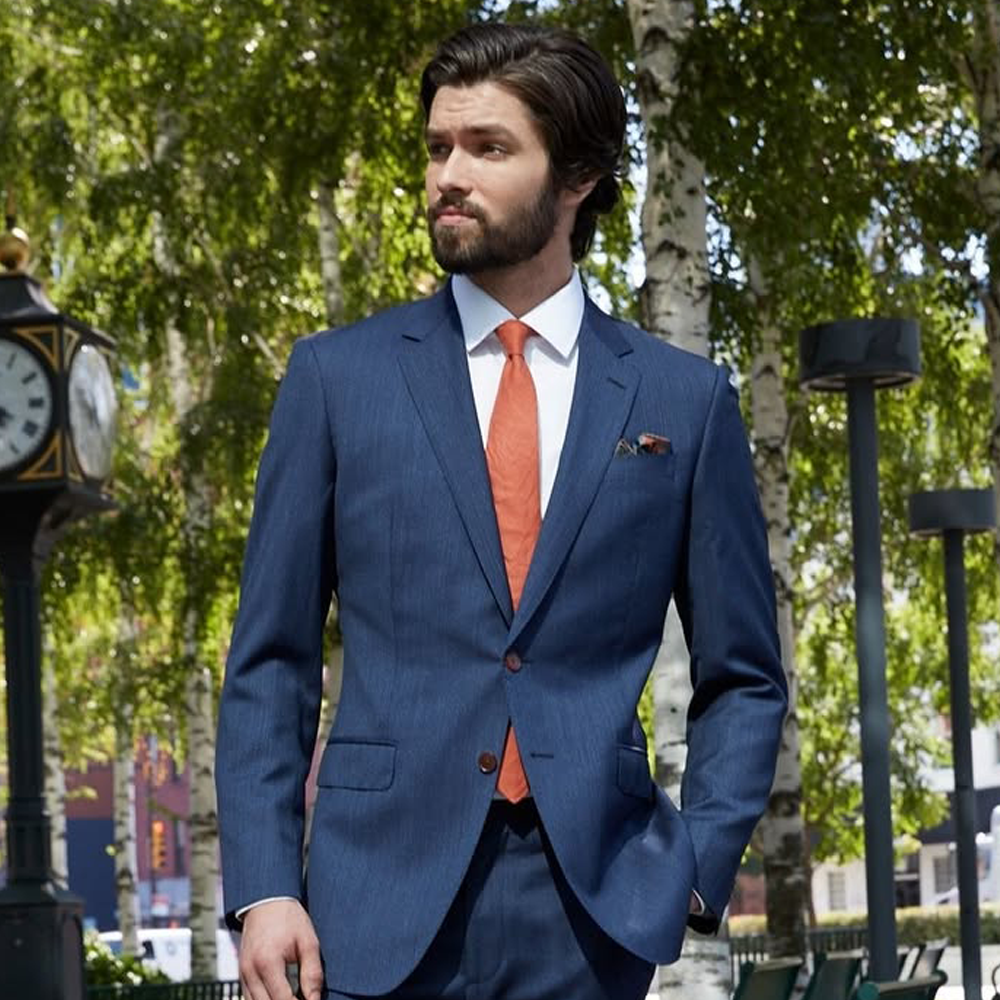 Elegant men's blue suit for professional and formal occasions. Perfect fit and high-quality tailorin.