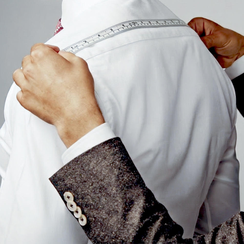 Tailoring process at H.M. Cole, focusing on precision and craftsmanship.