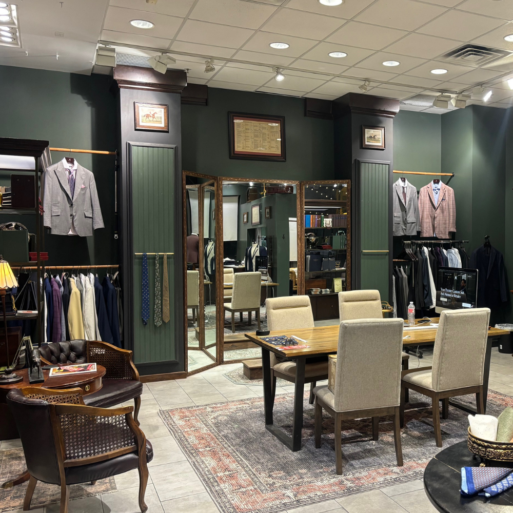 Men's fashion store interior showcasing suits, ties, and accessories for professional style.