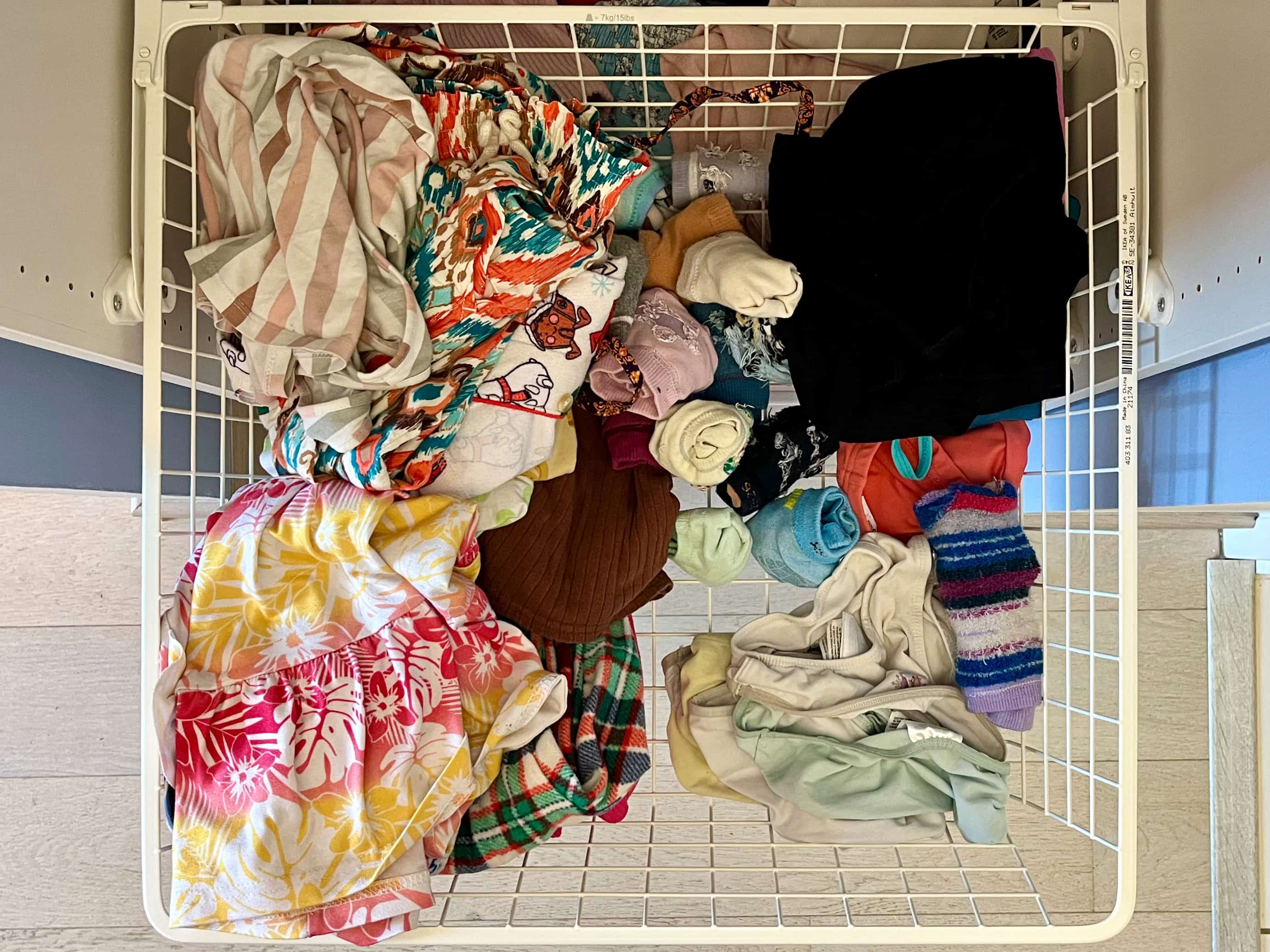 Before: Messy kids clothing drawer
