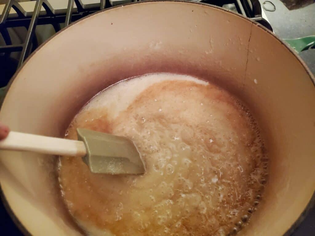 Butter and marshmallows melted together in a pot.