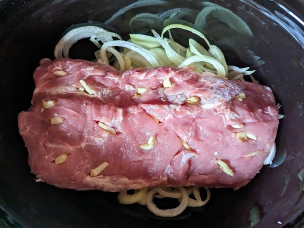 Garlic and onion pork roast ready to cook.