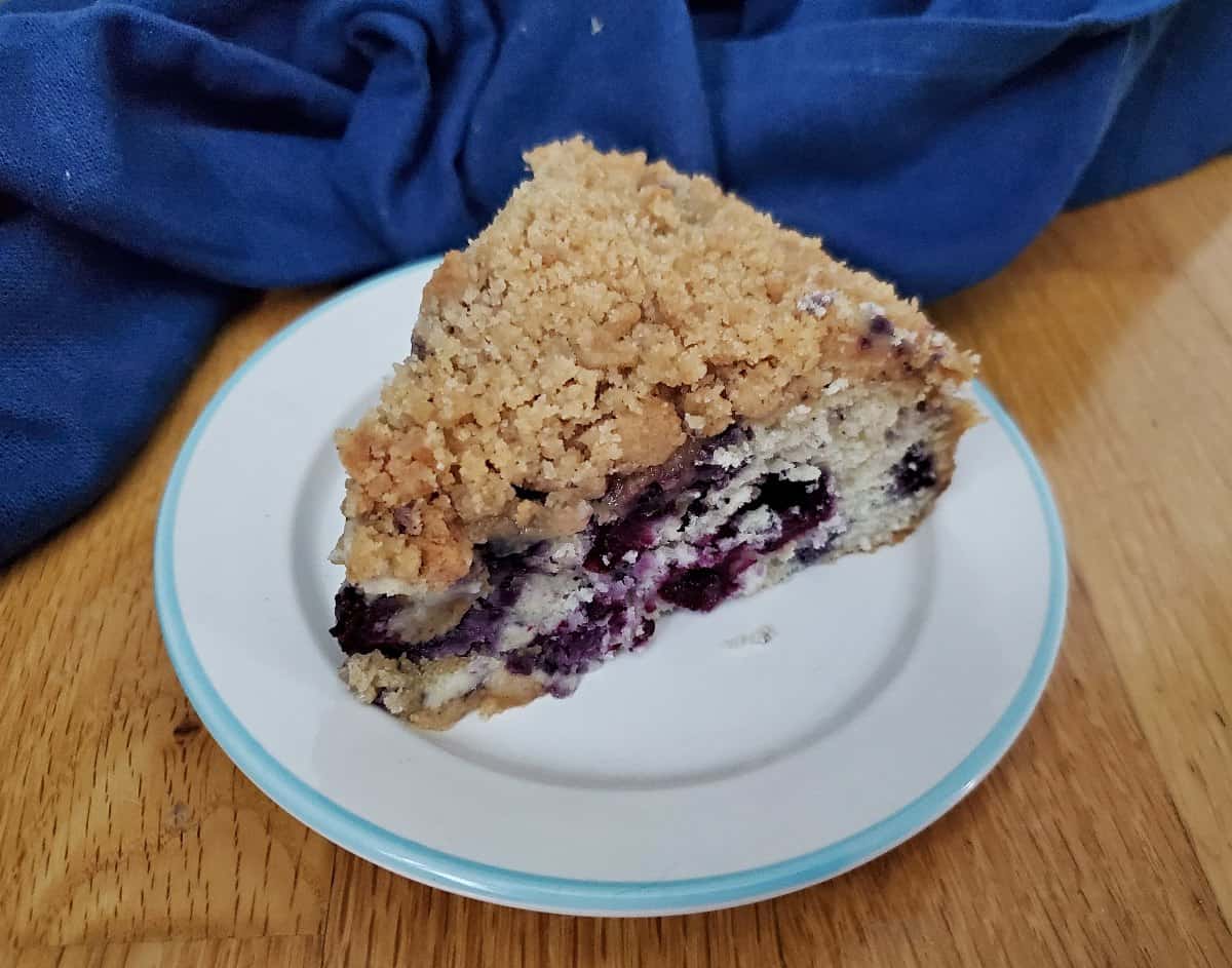 Slices of blueberry streusel coffee cake on a plate.
