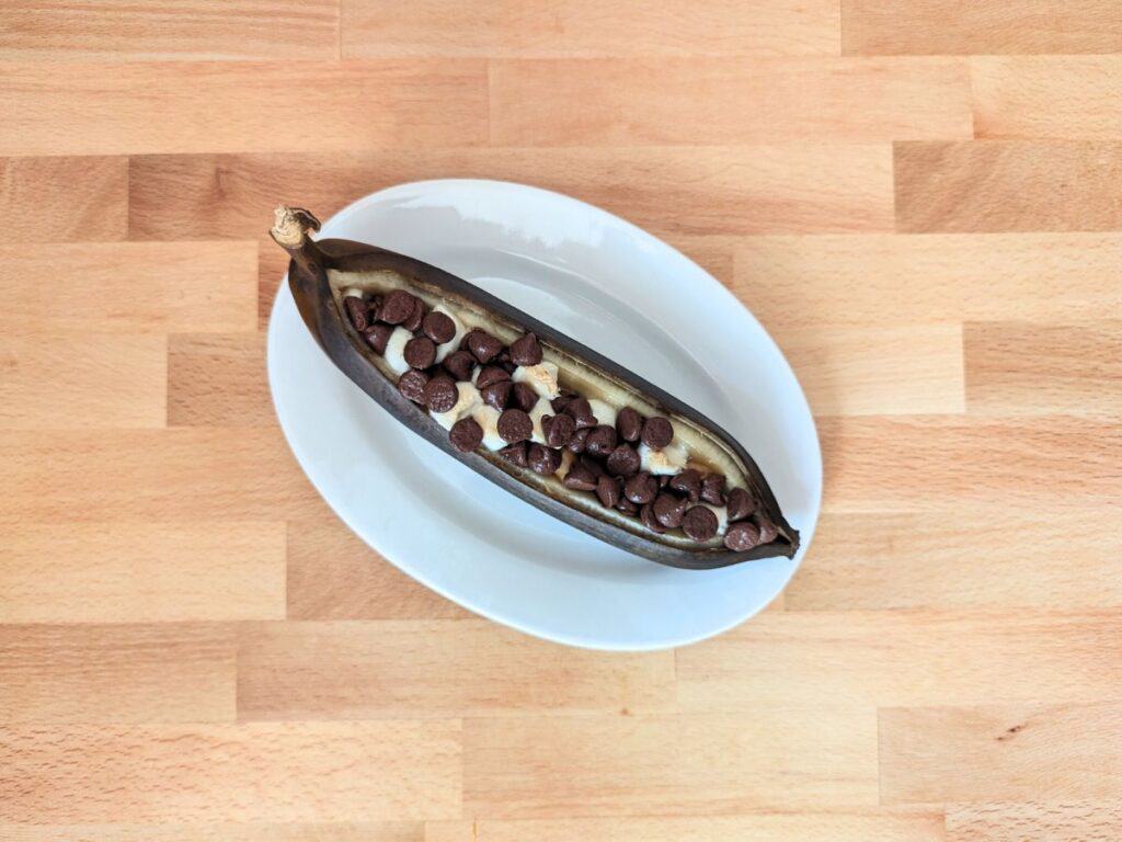 Image shows overhead shot of an irresistible banana boat.