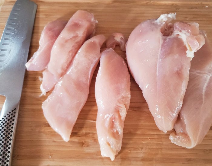 Cut chicken breasts into tenderloins