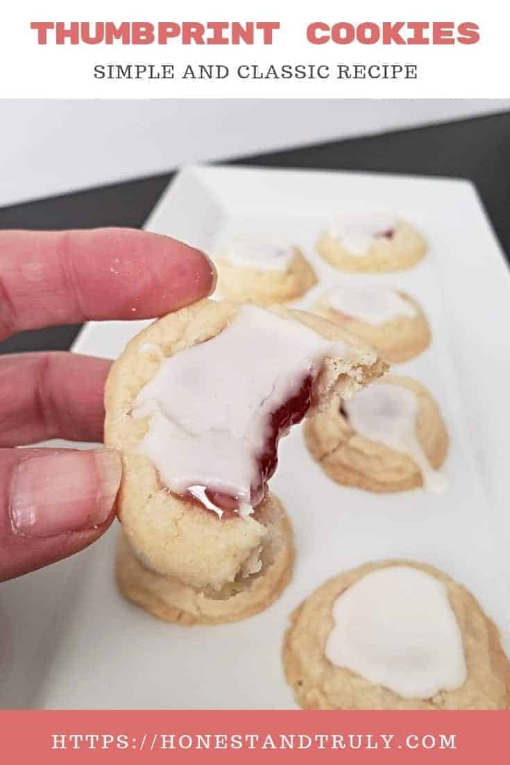 Simple classic thumbprint cookie recipe. This egg free cookie has so many layers of flavor. Use your favorite jam to fill it. This is so much more than a Christmas cookie. Enjoy this sweet treat all year round, it's such an easy recipe to make! #cookies #thumbprint #easyrecipe #desserts