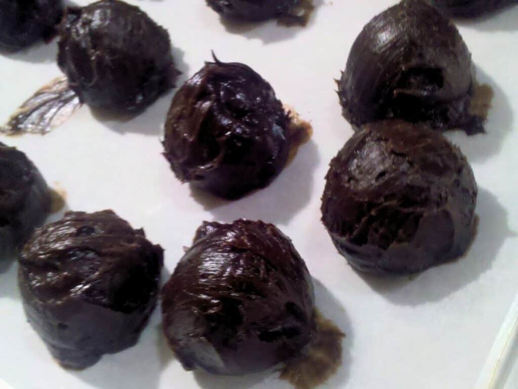 Image shows ready to be chilled truffles.