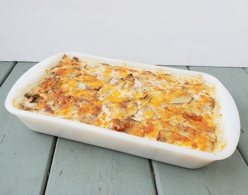 Pan of freshly baked cheesy scalloped potatoes