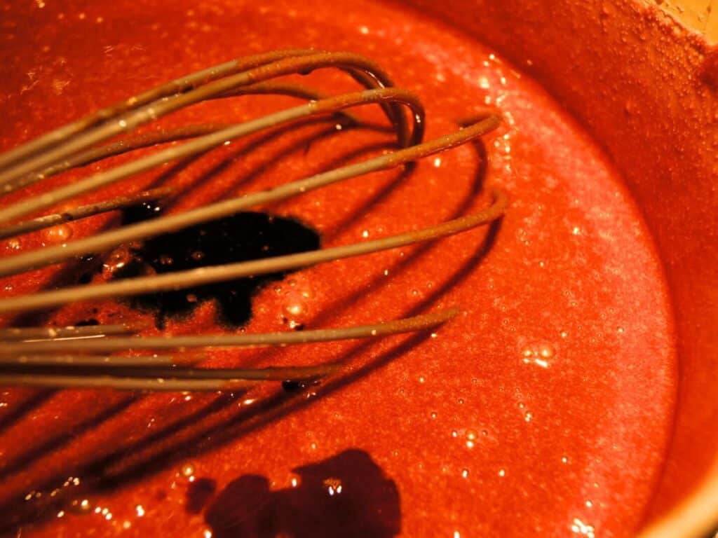 Image shows vanilla and coffee added to the mixture.