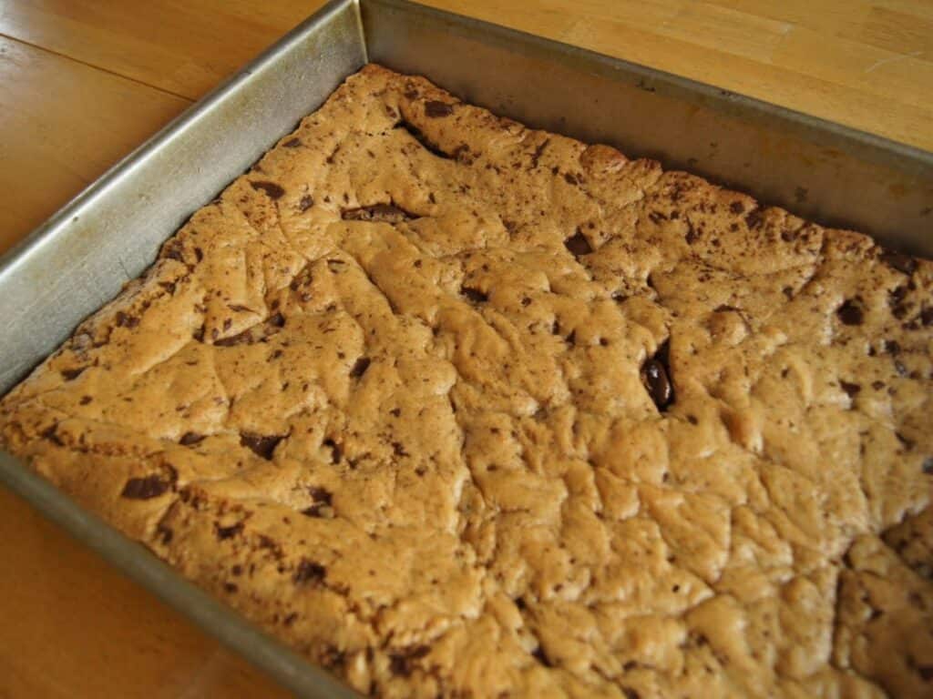 Image shows butterscotch brownies in the pan.