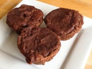 Image shows cherry bliss bites on a serving plate.