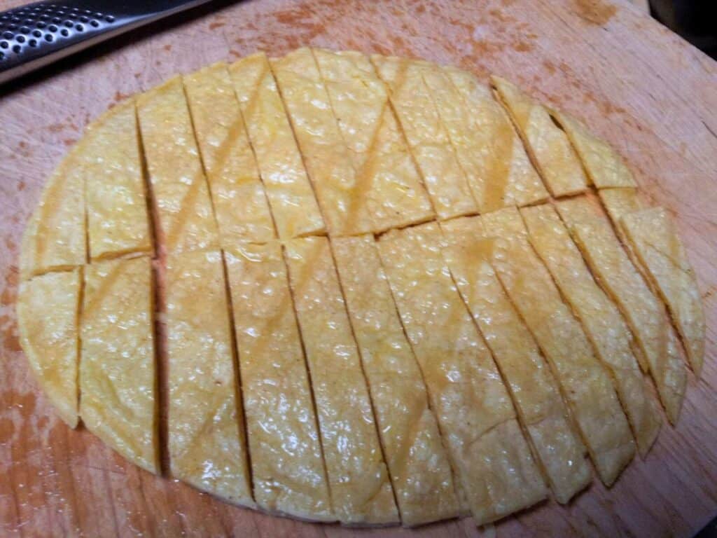 Image shows whole tortilla cut in strips.