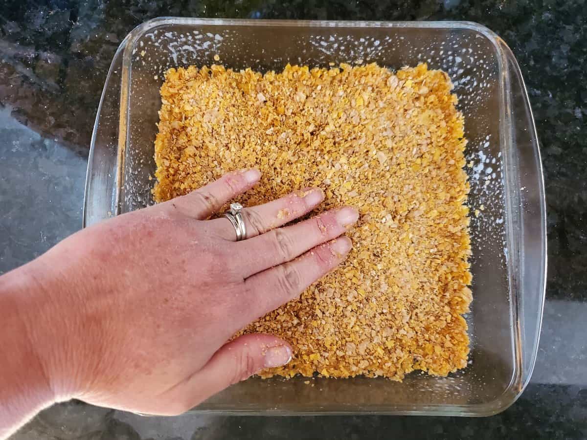 Pat cereal crumb crust into an 8x8 glass dish.