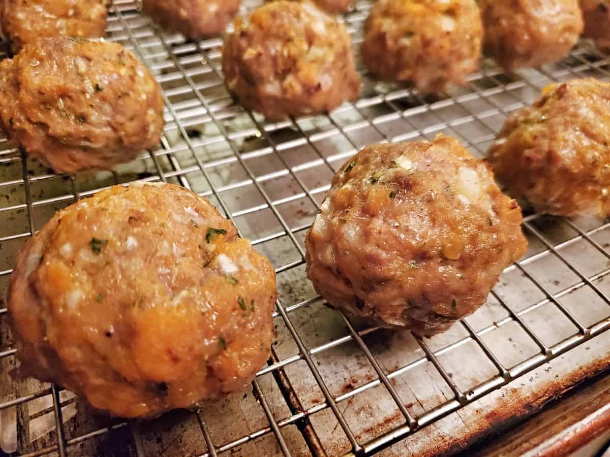 Just baked sweet potato meatballs on a baking tray.