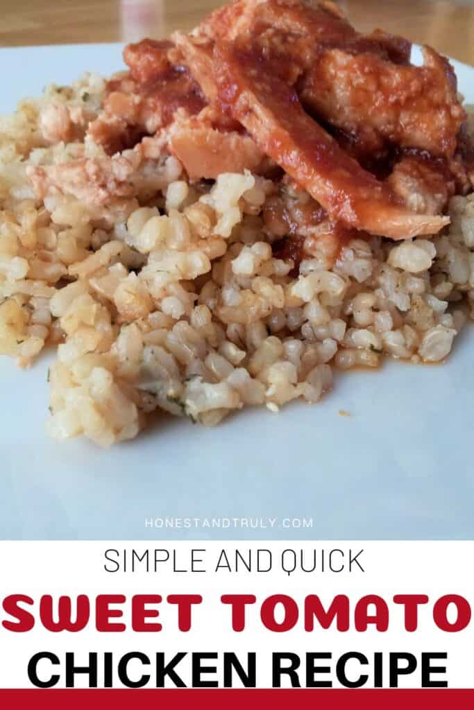 Image shows close-up picture of sweet tomato chicken on top of rice.
