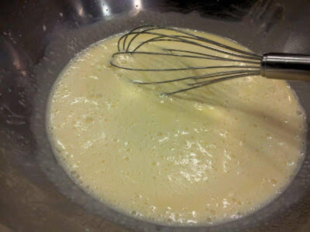 Image shows creme brulee ready for baking.