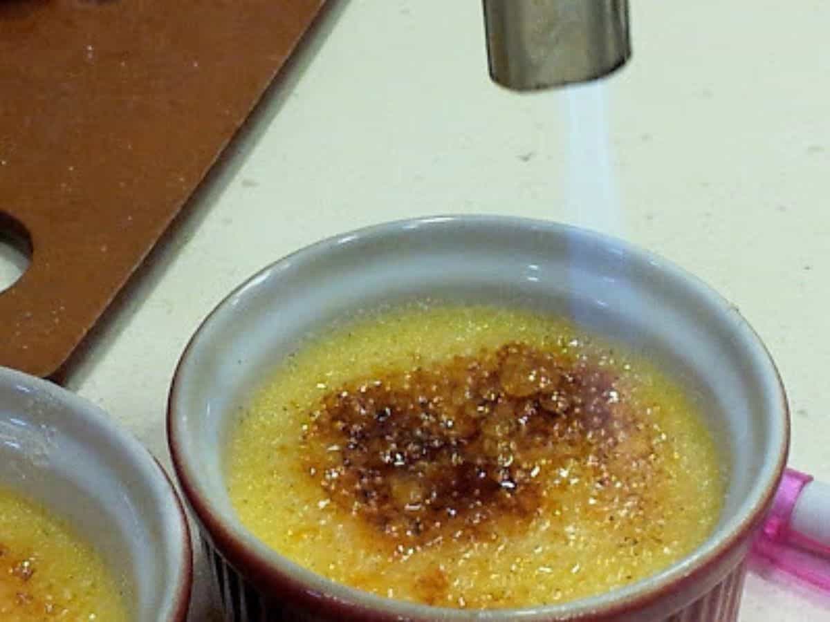 Image shows torching a creme brulee.