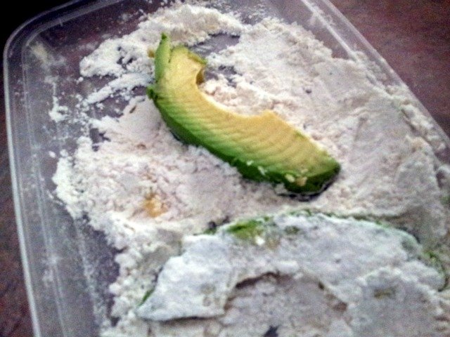 Dredge the fries in flour